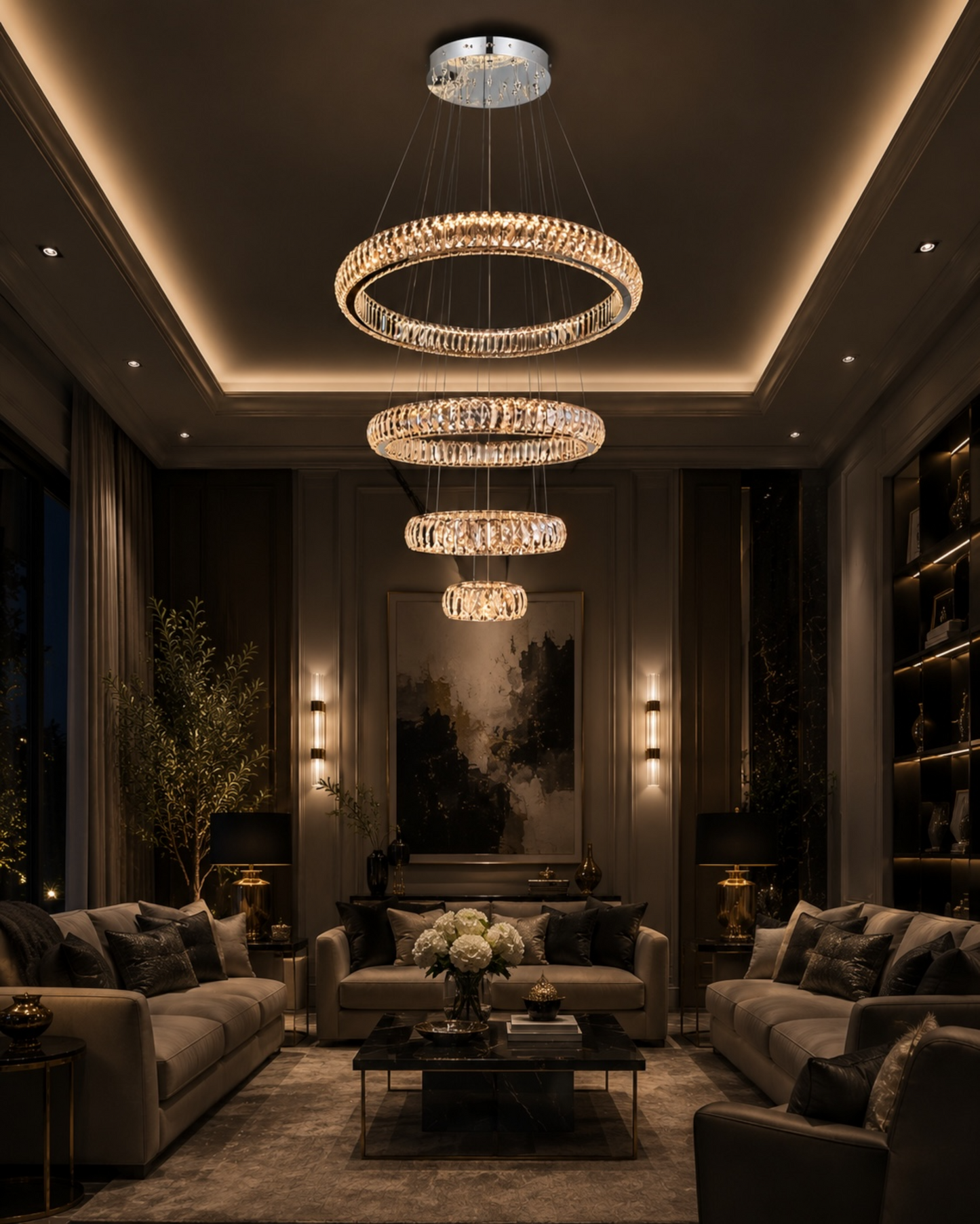 Modern chrome Crystal Ring Chandelier Installed in Luxury Living Room with High Ceiling and Ambient Lighting