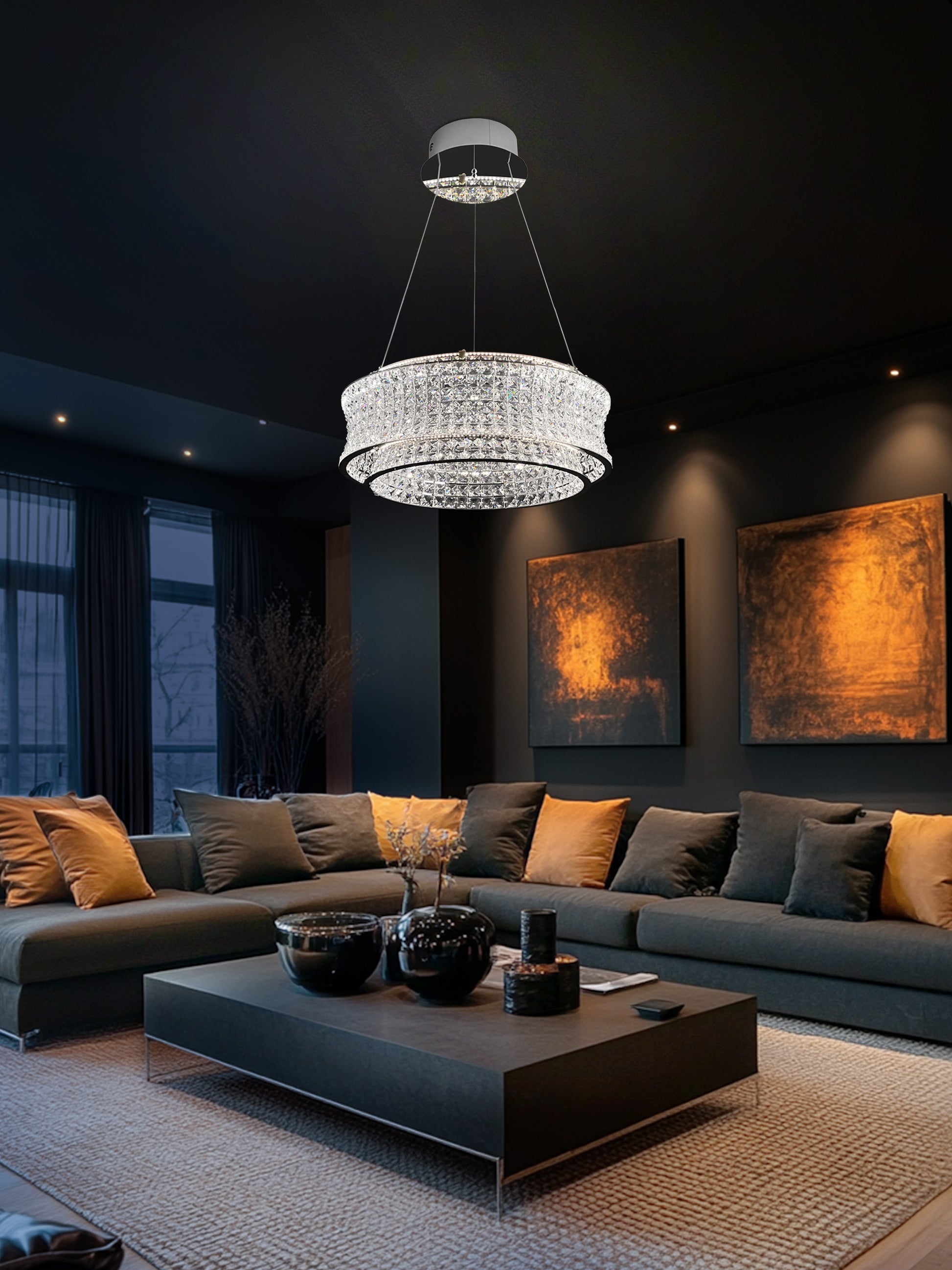 24-inch modern crystal LED chandelier displayed above a luxury living room seating area.