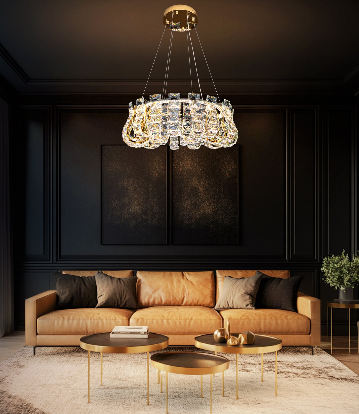 Modern gold crystal chandelier hanging over a dining table in an elegant contemporary interior.
