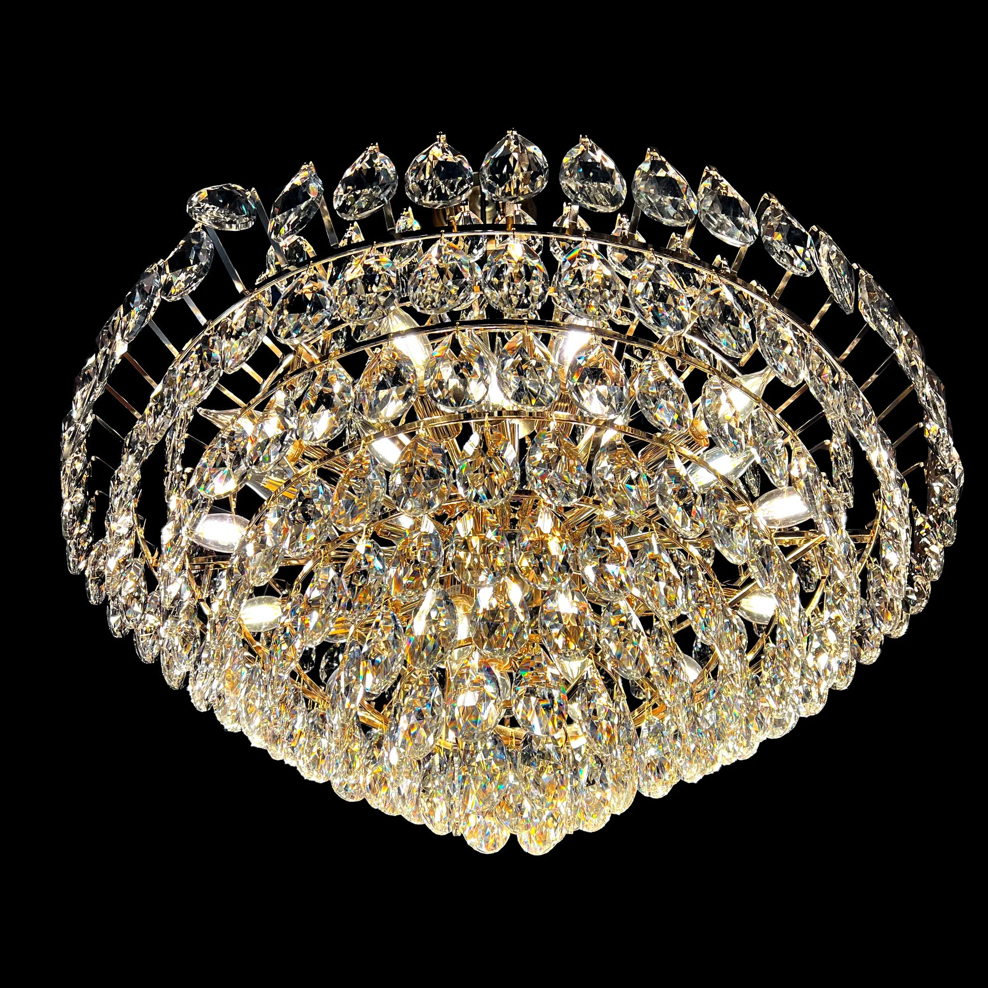Bottom view of round gold crystal chandelier with 30% lead crystal sparkling faceted crystal layers.
