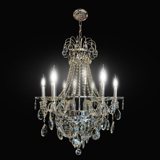 A luxurious vintage crystal chandelier with a chrome finish, featuring many precision-cut crystals and eight light bulbs, designed to provide brilliance and sparkle.