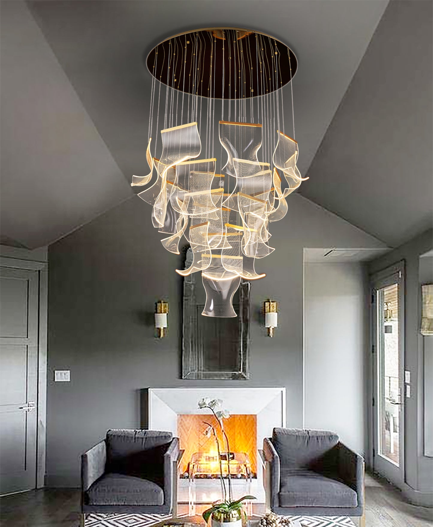  Adjustable and dimmable gold chandelier with sculptural wave panels creating soft ambient lighting in a modern living room.
