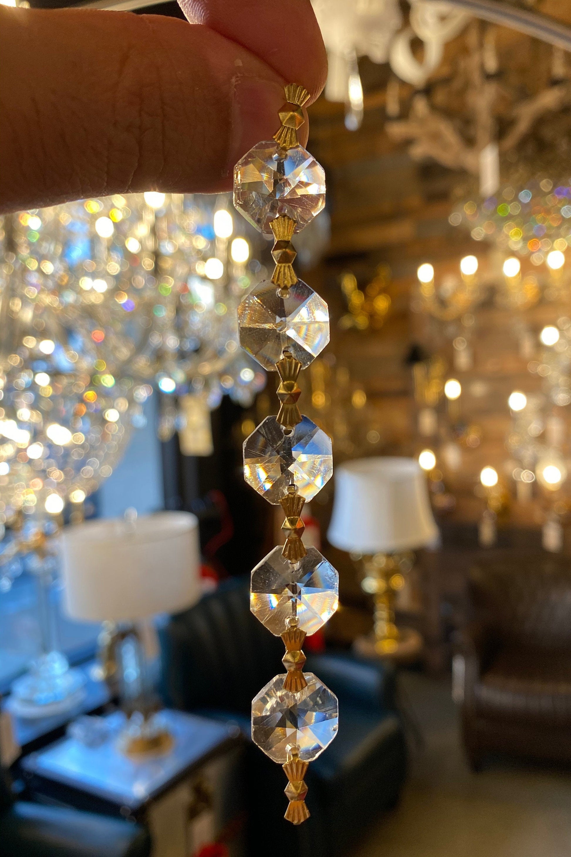 Crystal strands installed on luxury chandelier lighting