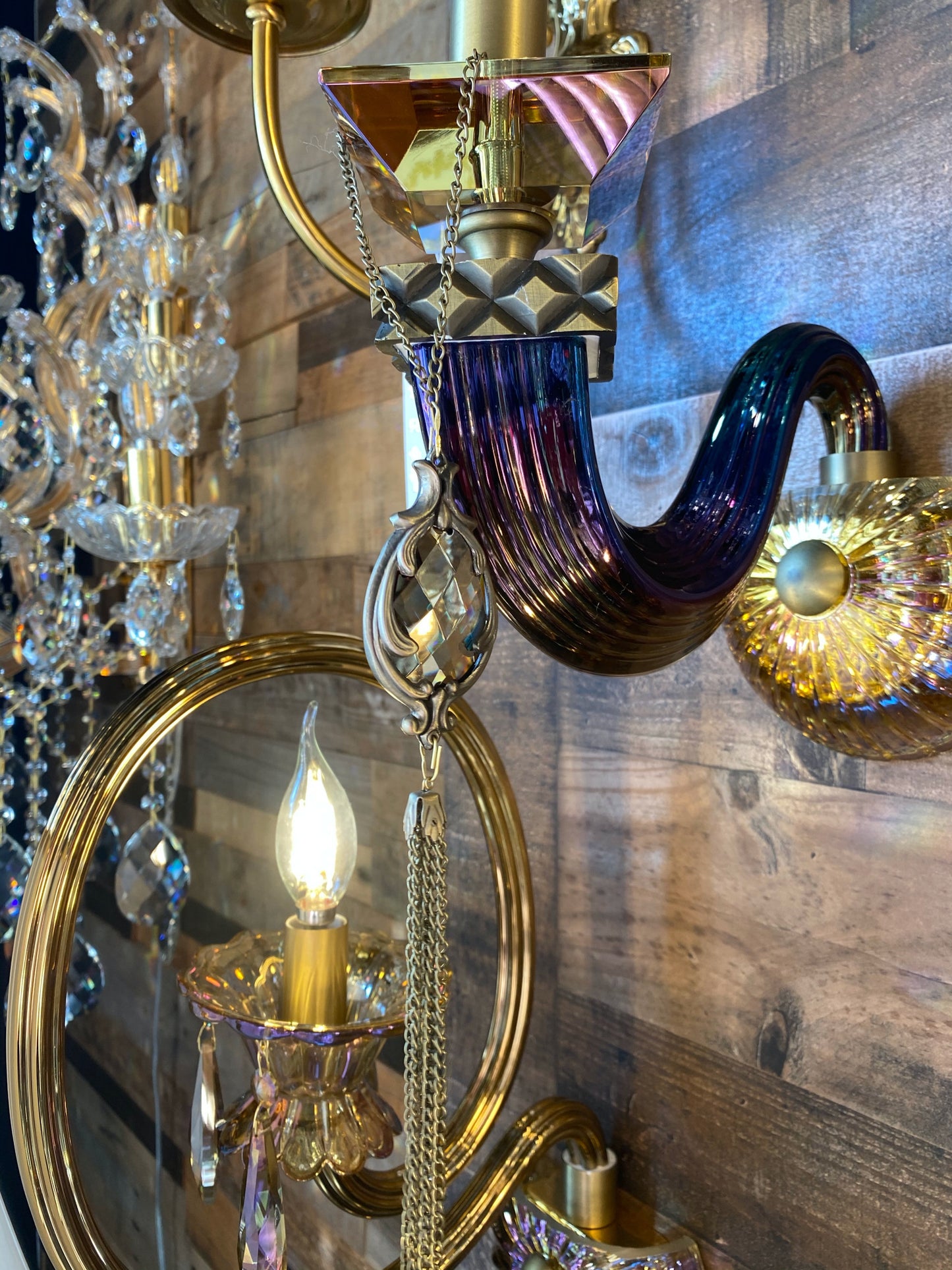 Curved handcrafted Italian glass arm wall sconce detail
