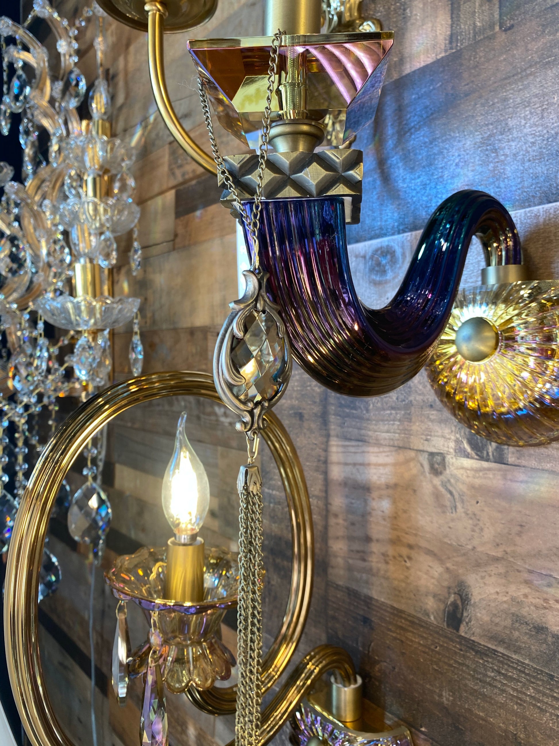Curved handcrafted Italian glass arm wall sconce detail