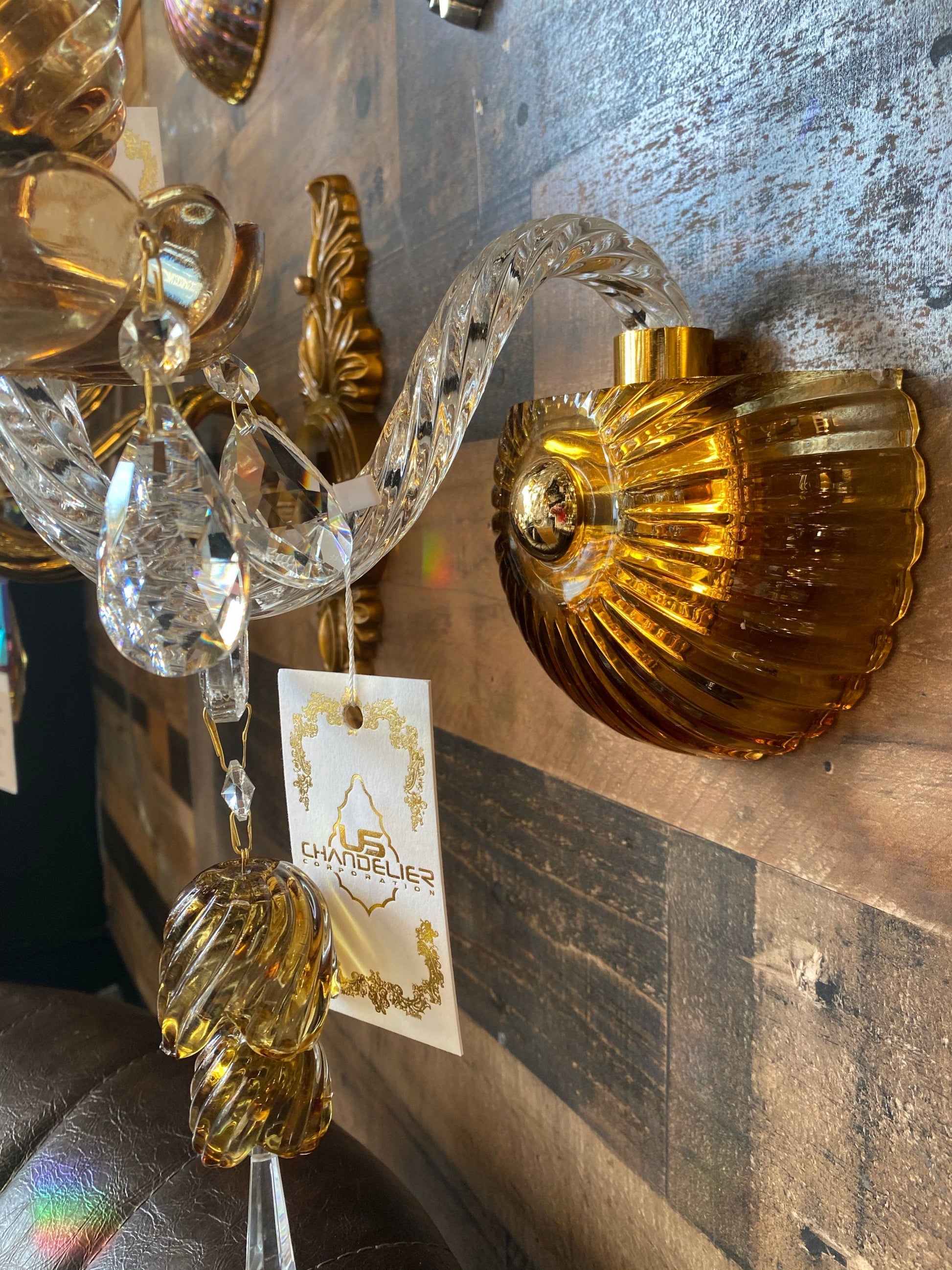 Crystal accent detail on handcrafted Italian glass wall sconce