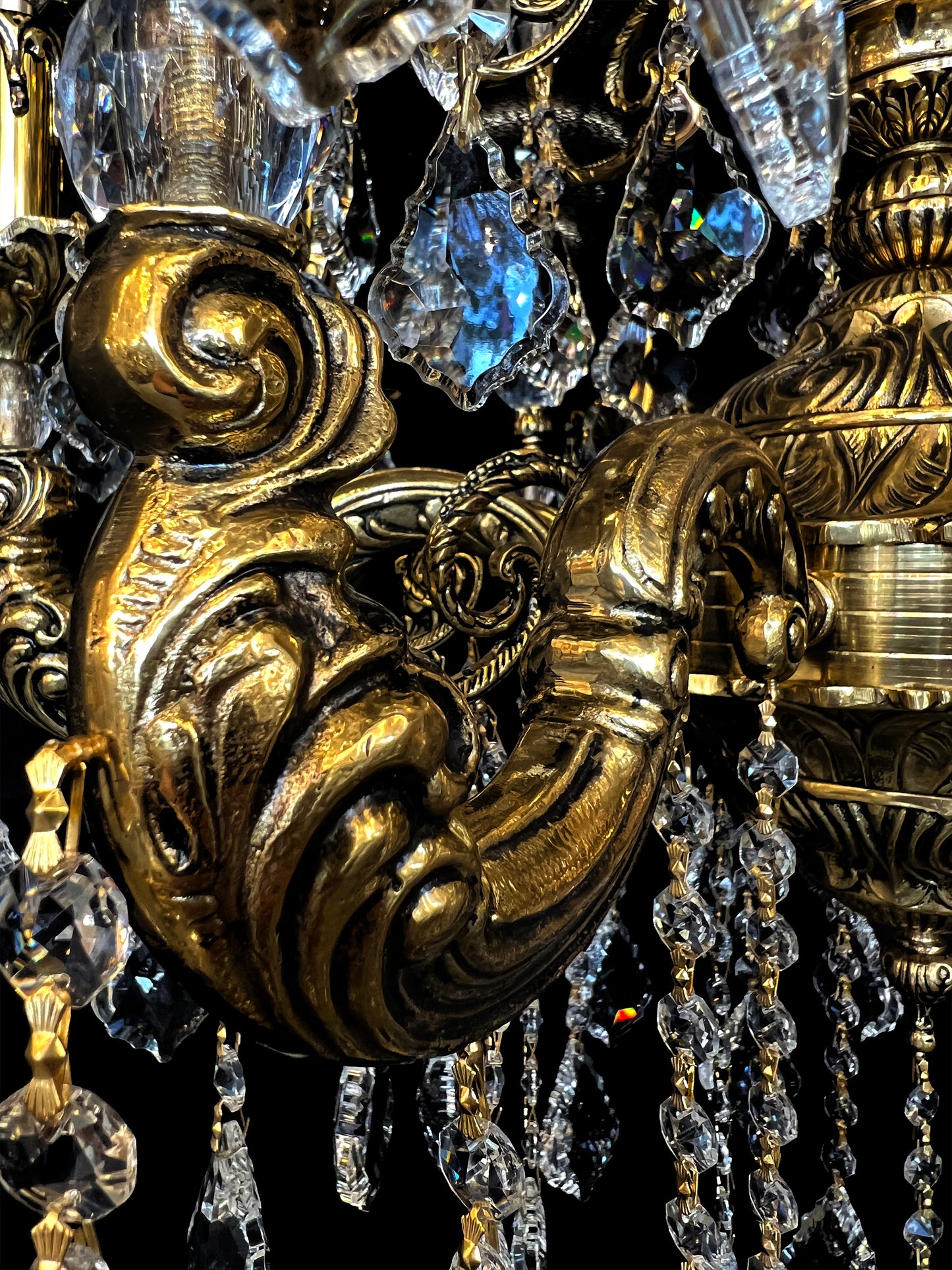 Detailed view of handcrafted Italian brass chandelier frame