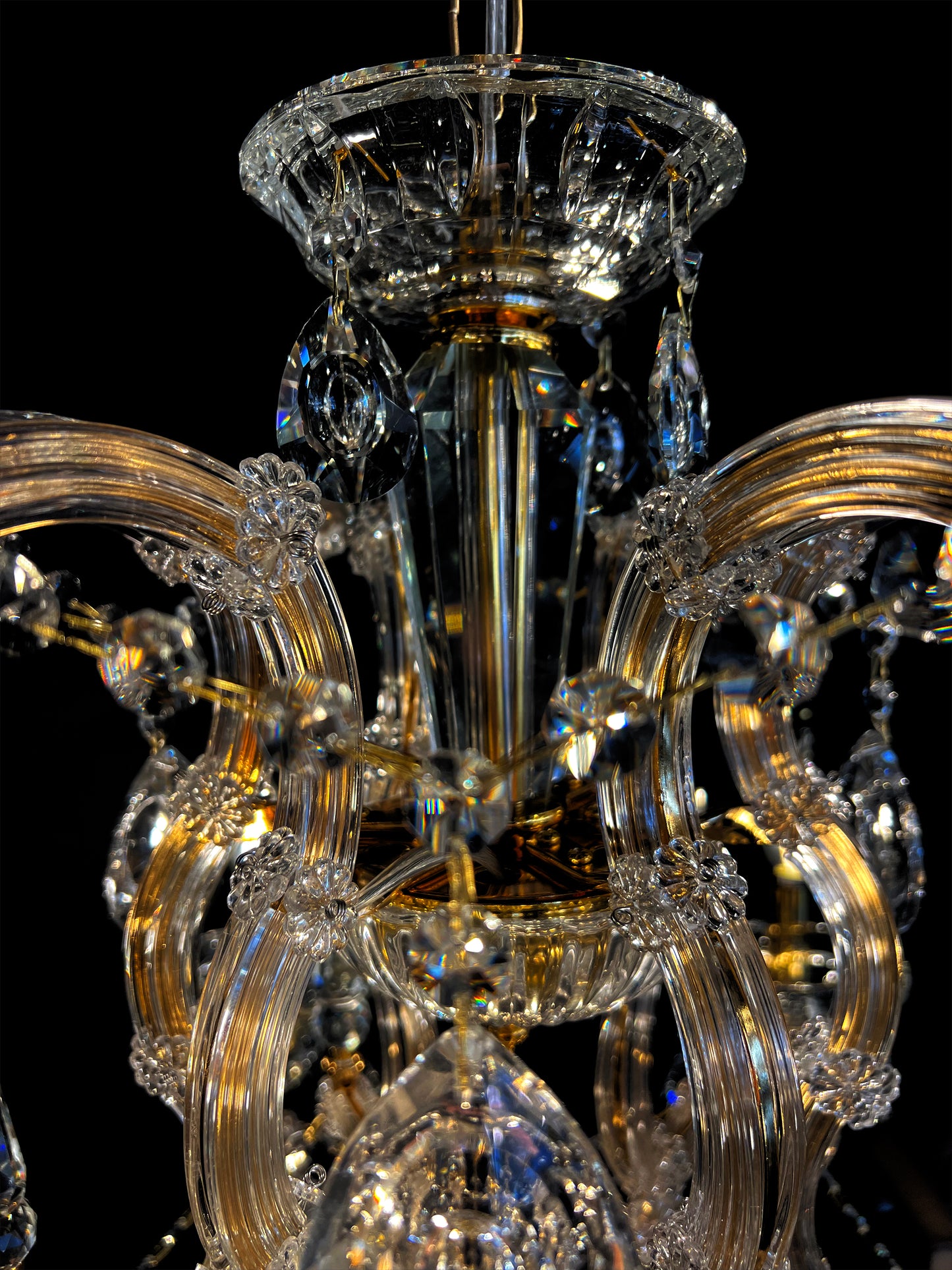 Maria Theresa gold crystal chandelier ornate center detail