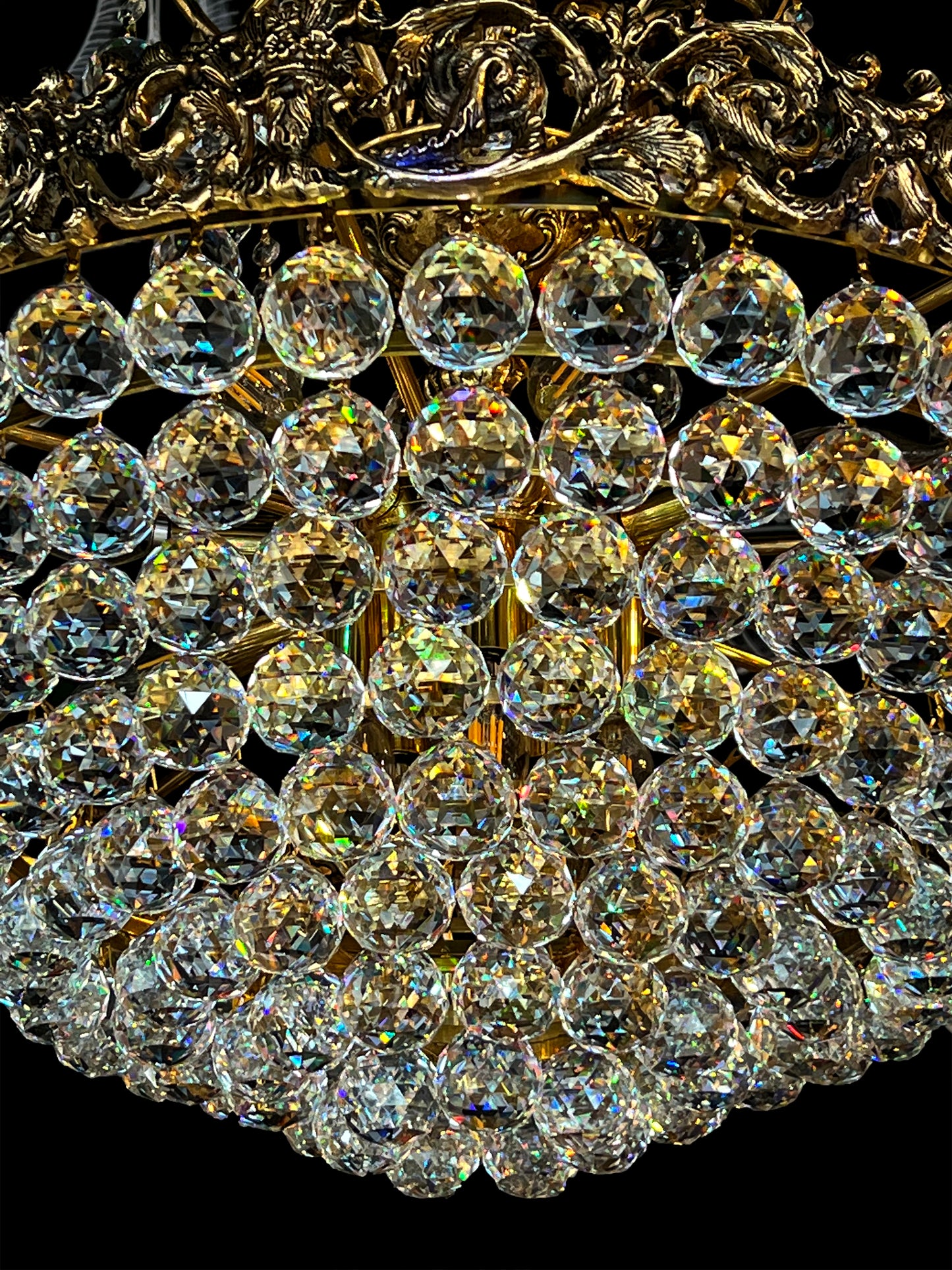 Close-up of handcrafted crystal layers reflecting warm golden light