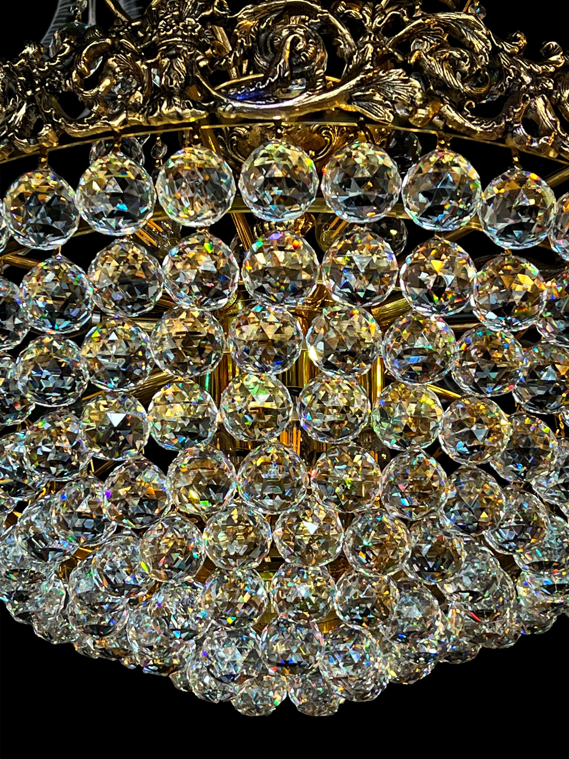 Close-up of handcrafted crystal layers reflecting warm golden light