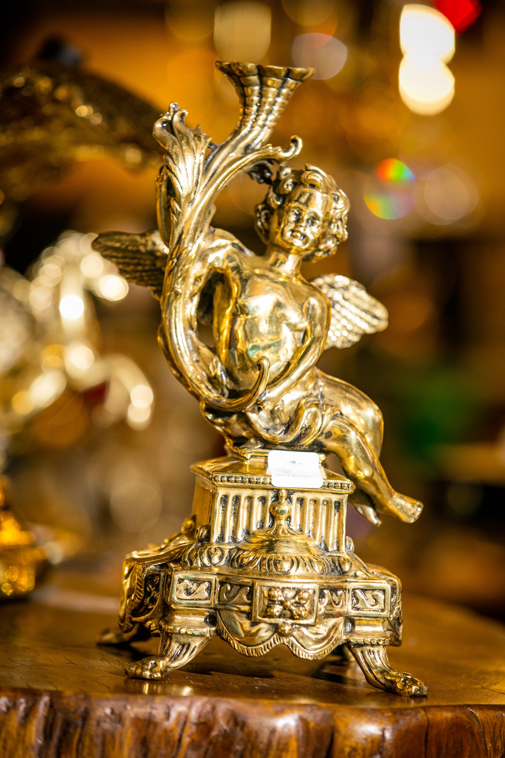 Technical specifications for the brass Cupid: 12" height and approximately 6bs weight