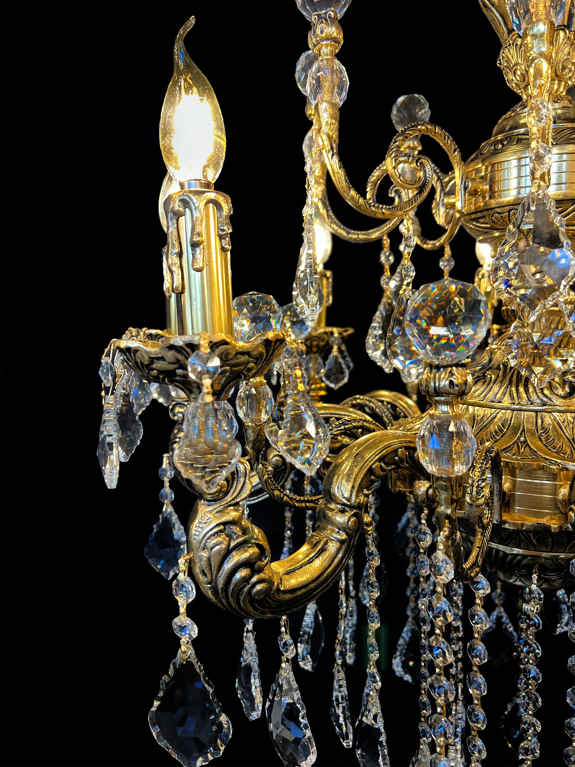 Side profile showing ornate Italian brass chandelier arms