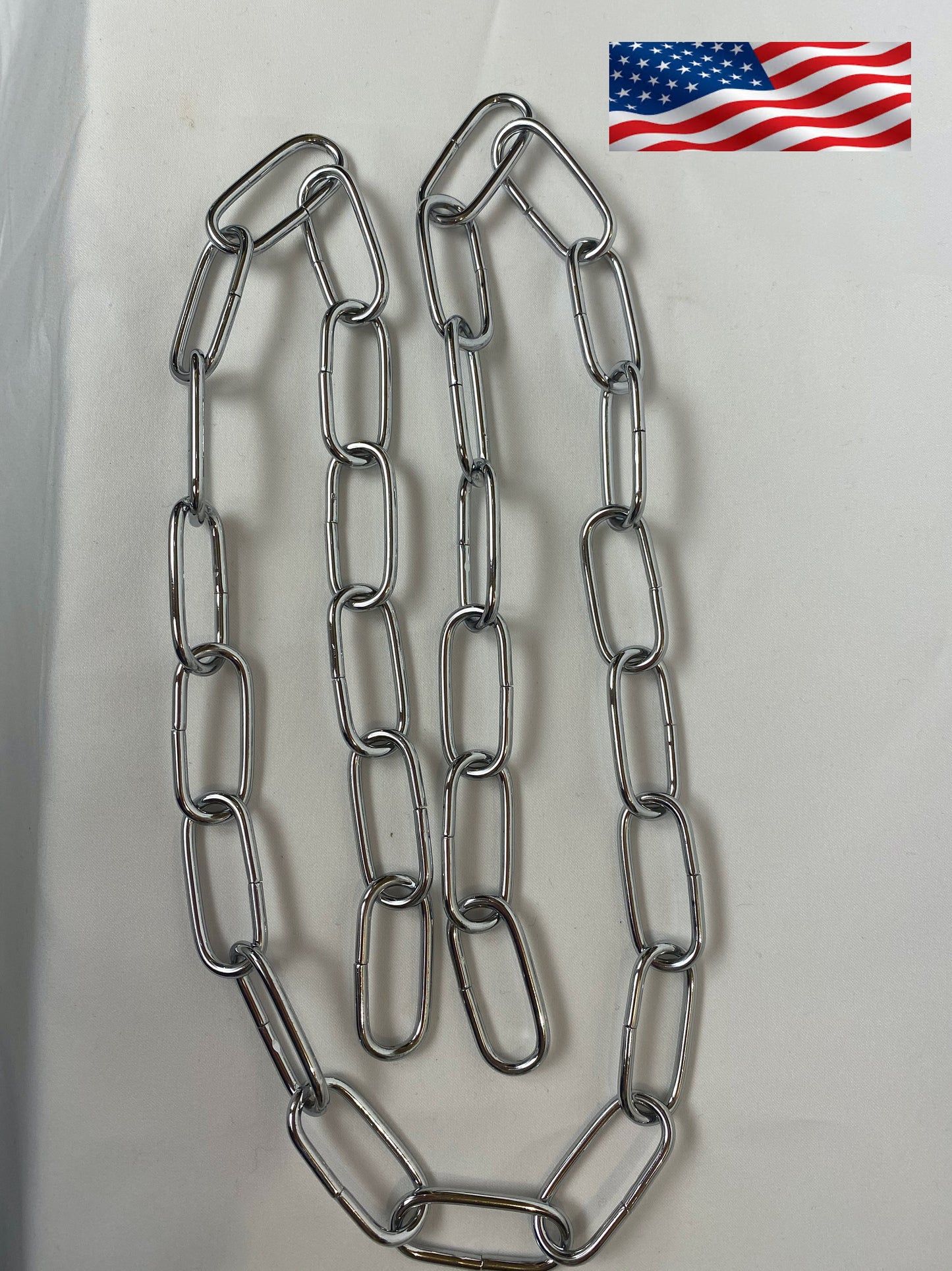 Chrome chandelier chain installed on lighting fixture