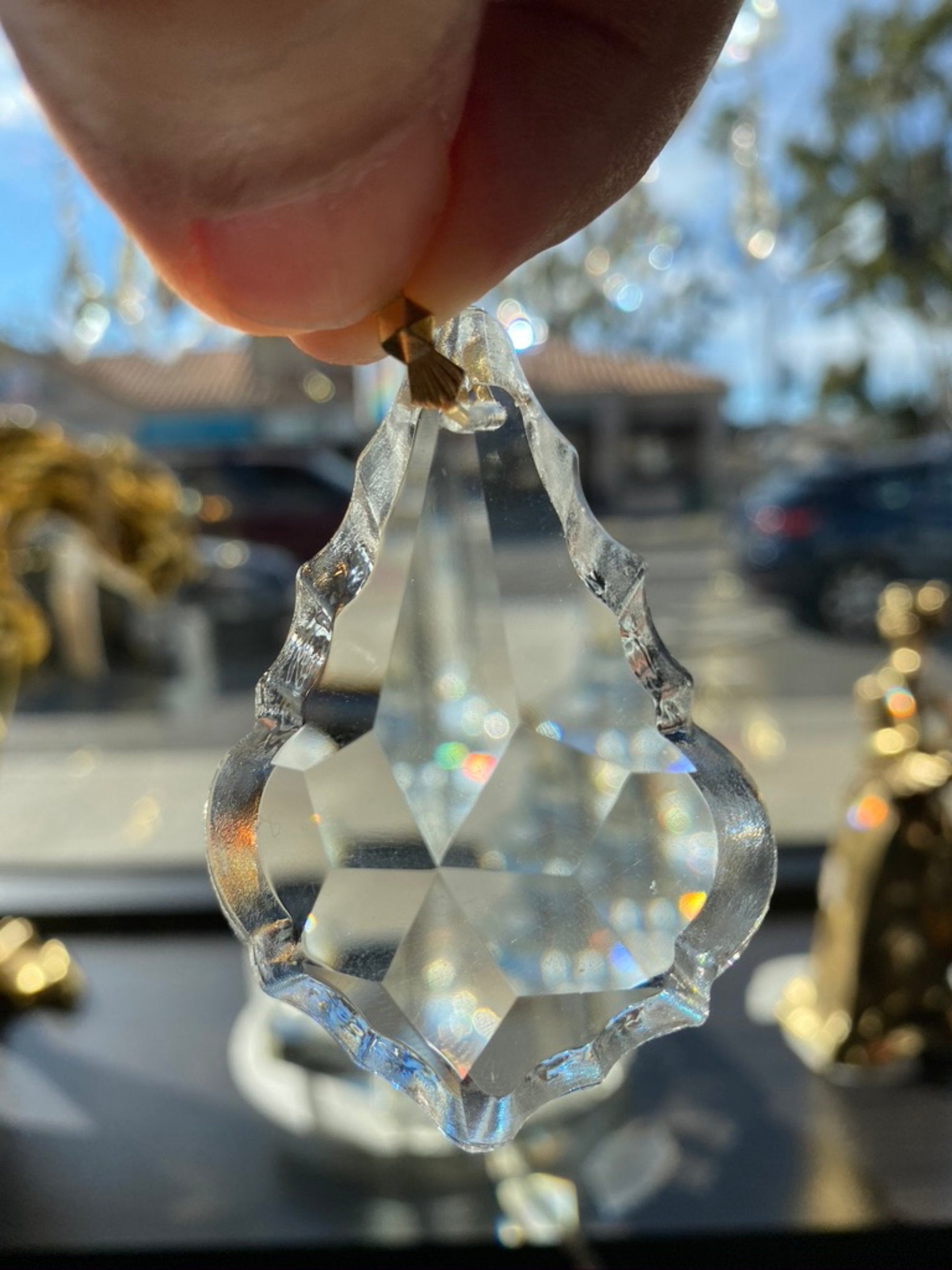 Handheld 50mm crystal leaf showing precision cut full lead crystal facets