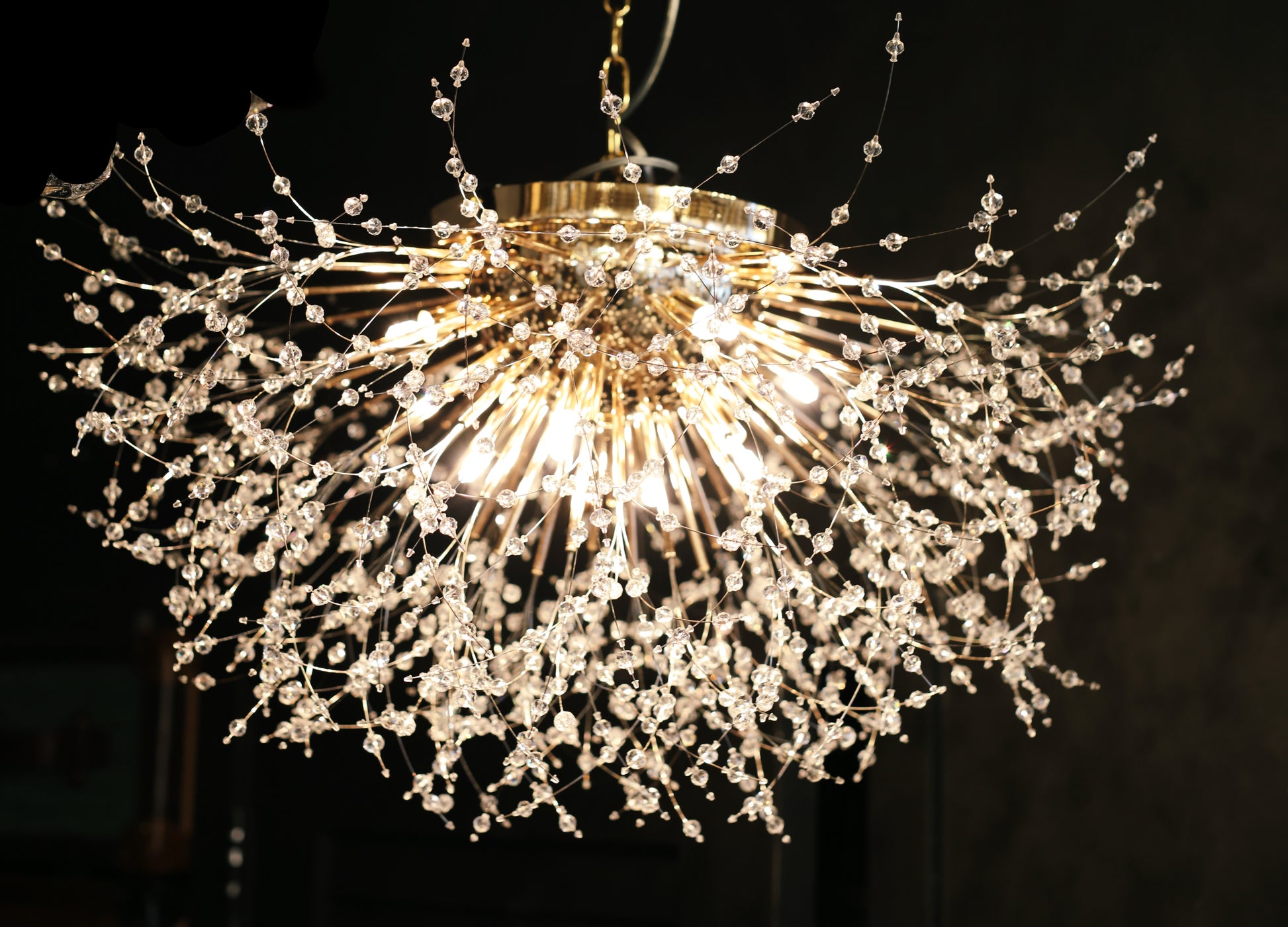 Dimmable gold chandelier featuring G9 LED bulbs and sparkling crystals