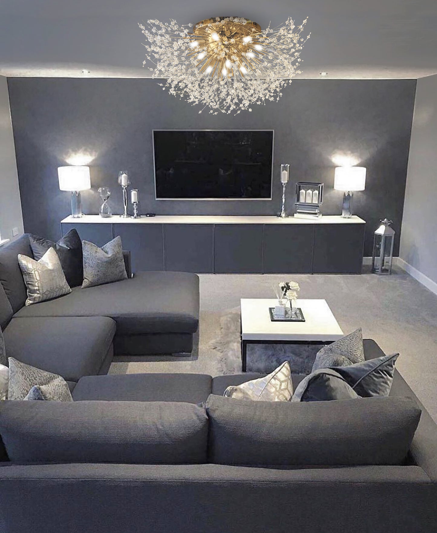 Elegant gold flush mount chandelier illuminating modern living room interior