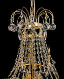Upper section of chandelier featuring curved gold arms and crystal chains.