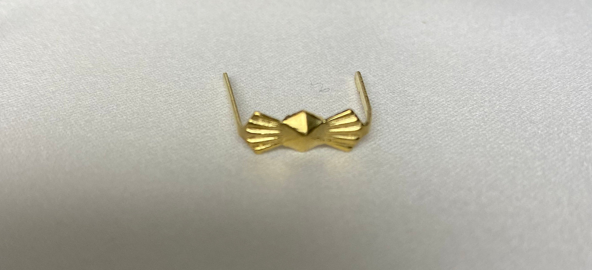 Golden brass clip connection for crystal strands
