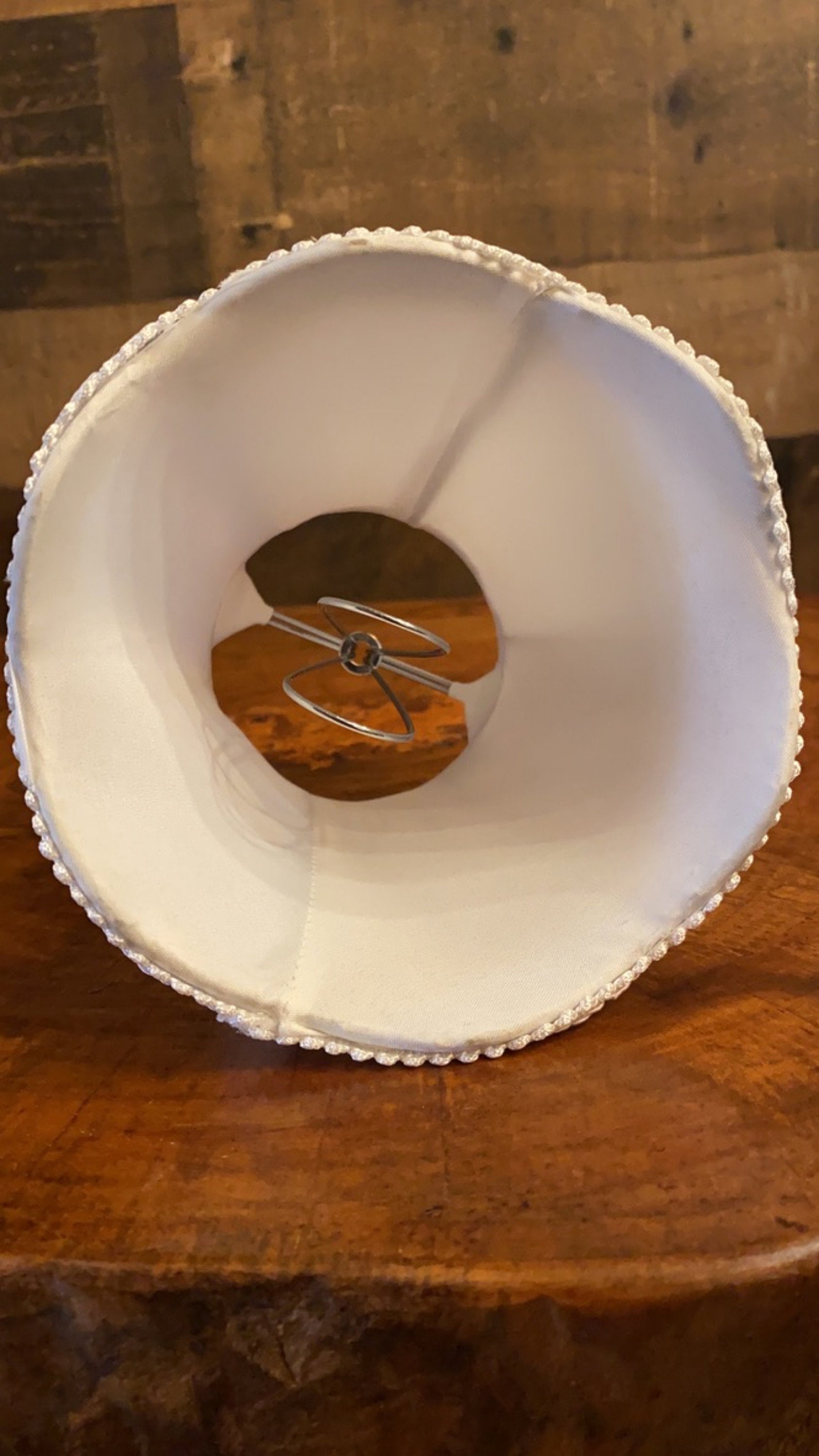 Interior view of gray satin fabric lamp shade