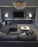 	Modern gold ceiling light with precision-cut crystal branches for living room