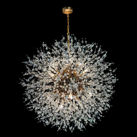 A 24-inch gold crystal chandelier with a starburst design, featuring nano-cut crystal beads and a central gold fixture, hanging from a gold chain.