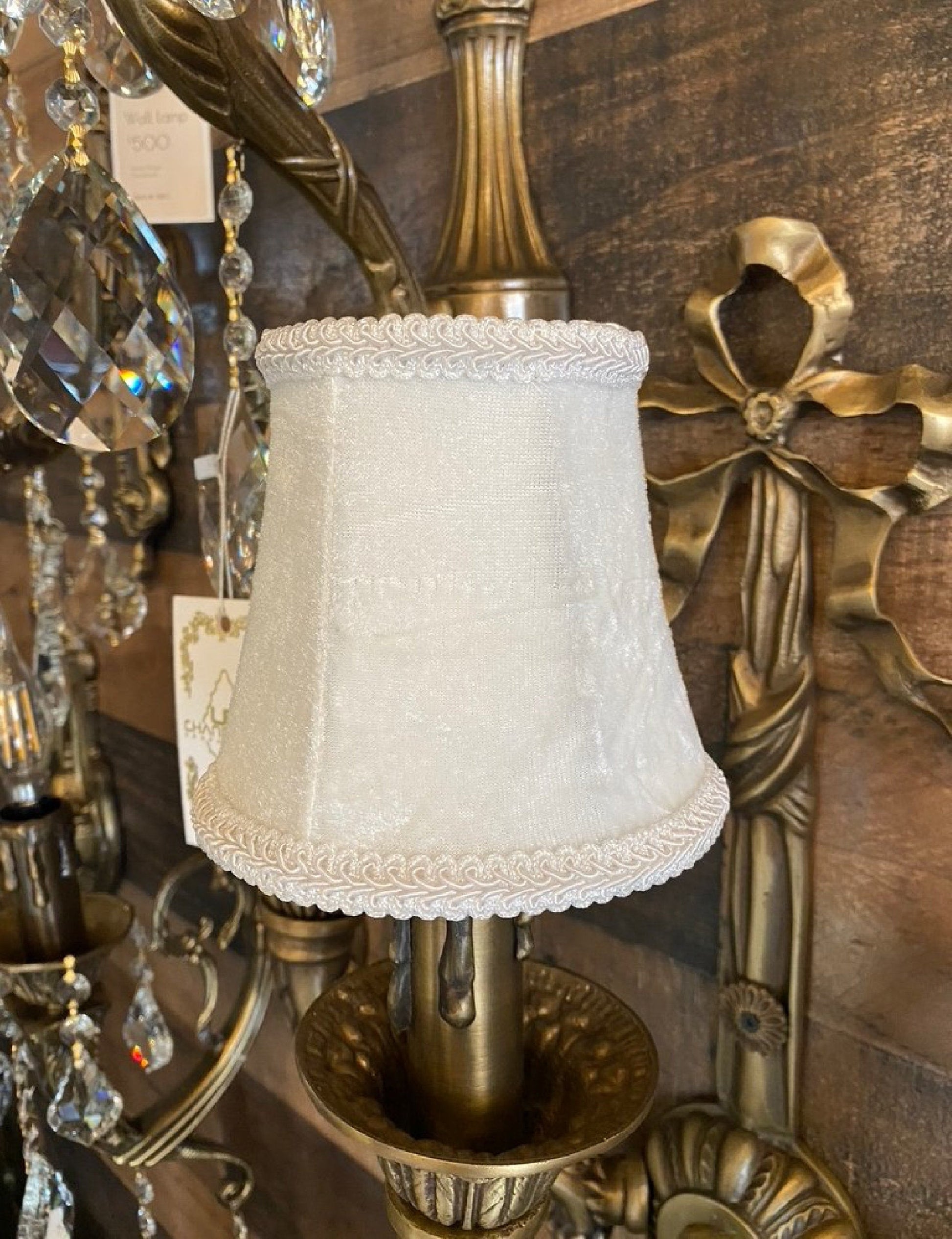 White velvet clip-on shade installed on lamp  arm